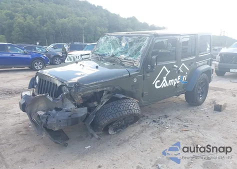 2016 Jeep Wrangler Unlimited Black Bear z USA, uszkodzony, nr VIN 1C4BJWDG9GL142162